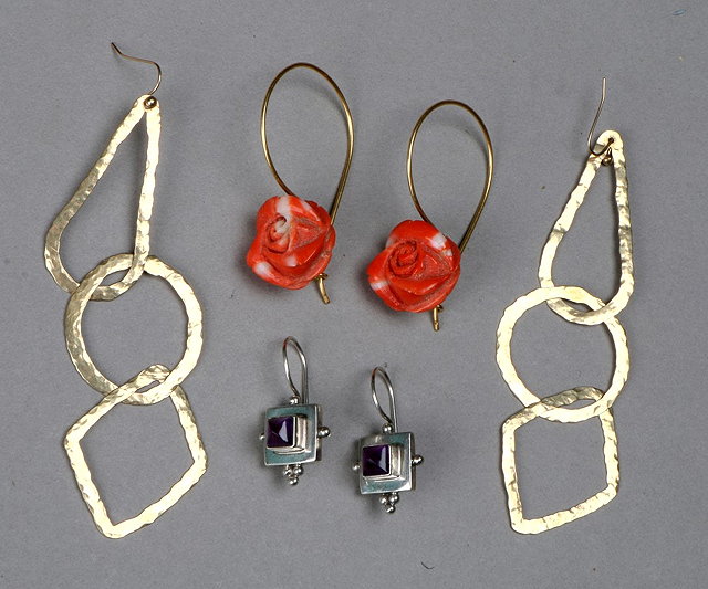 Appraisal: A PAIR OF CORAL DROP EARRINGS carved in the form