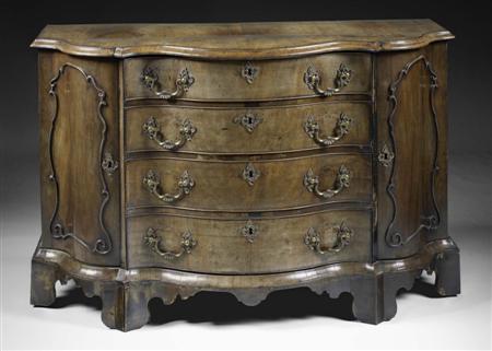 Appraisal: GEORGE III MAHOGANY SERPENTINE COMMODE ATTRIBUTED TO WRIGHT AND ELWICK