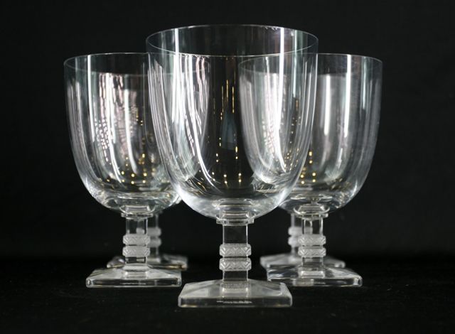 Appraisal: Five Lalique pedestal goblets with square form feet