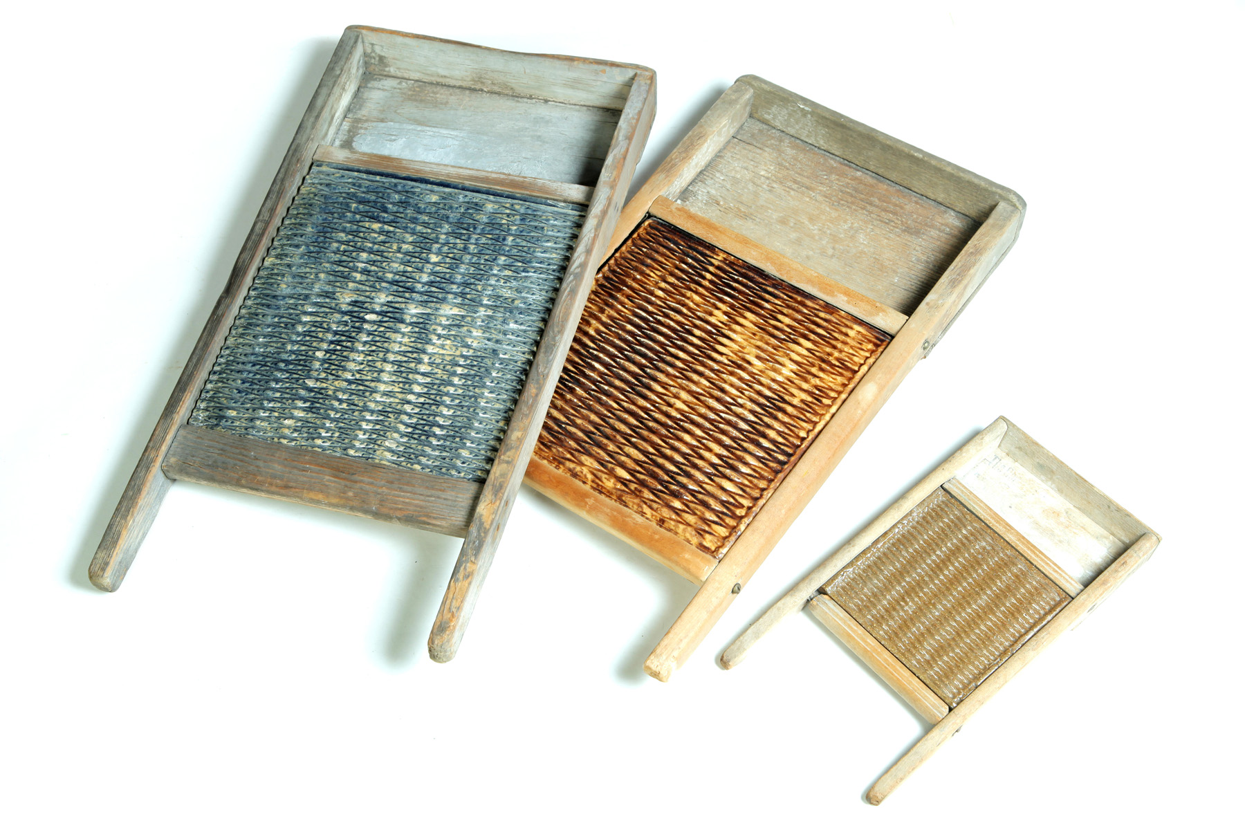 Appraisal: THREE WASHBOARDS WITH BENNINGTON YELLOWWARE INSERTS American st quarter- th