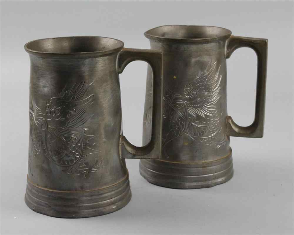 Appraisal: TWO ORIENTAL PEWTER MUGS with glass inset bases the fronts