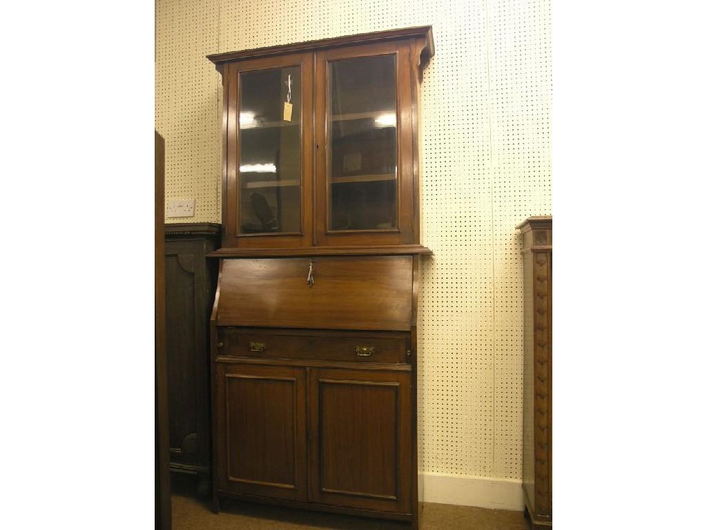 Appraisal: An Edwardian solid walnut bureau bookcase upper stage with two