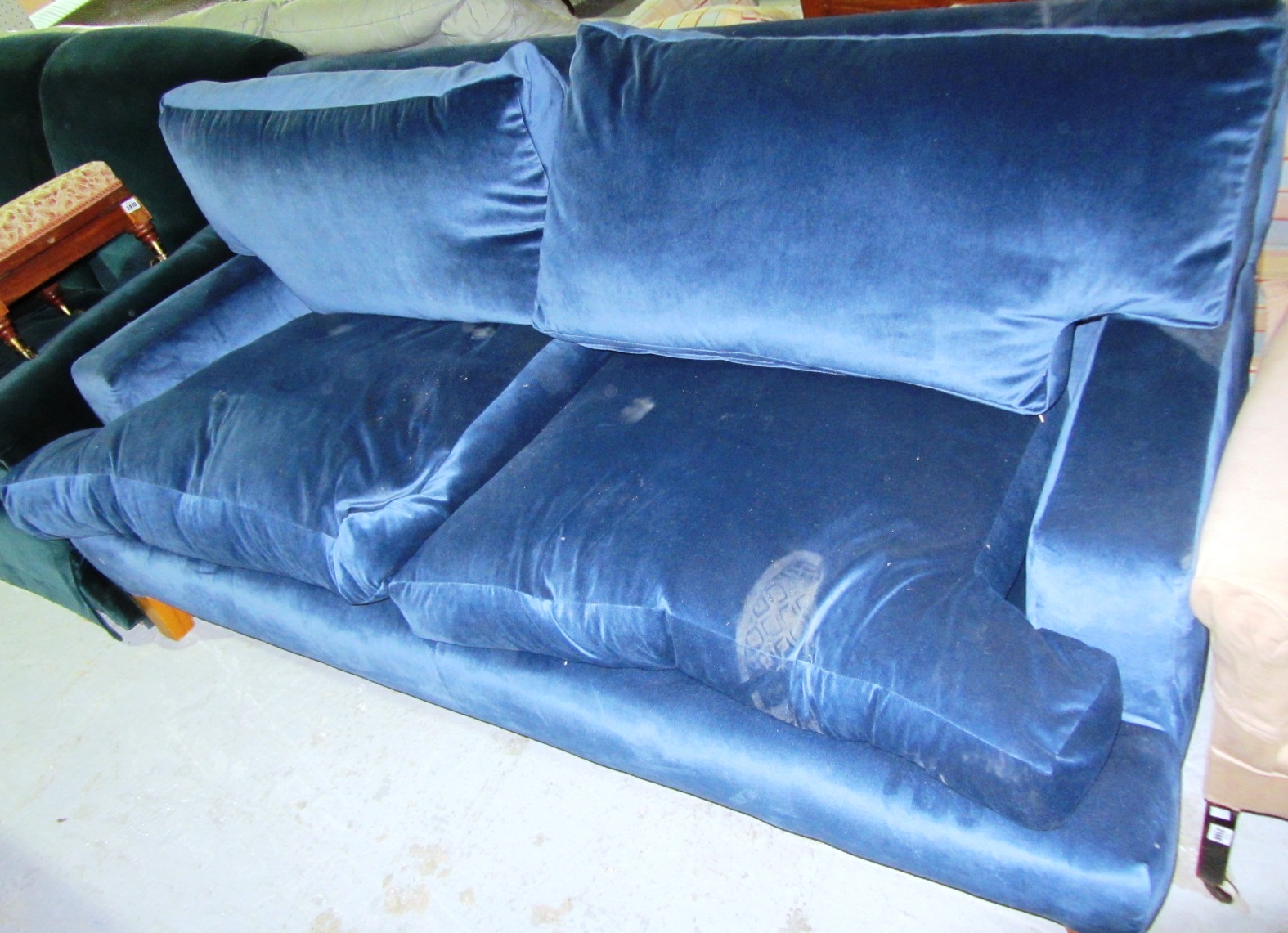 Appraisal: A th century blue velvet two seat sofa