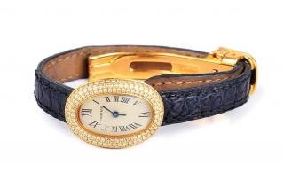 Appraisal: A Gold and Diamond Ladies' Watch by Cartier Crafted using