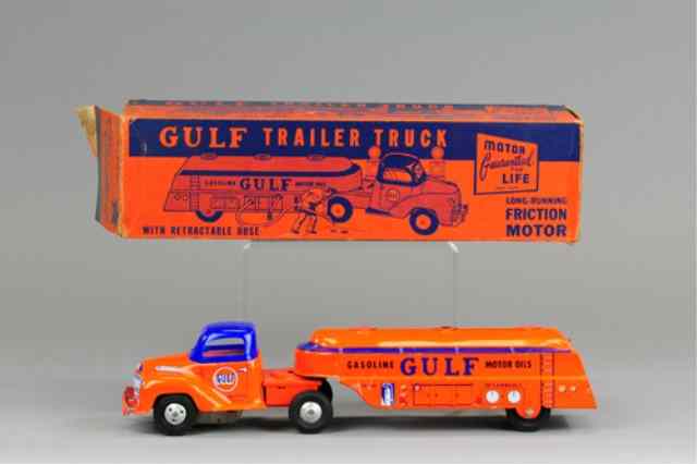 Appraisal: COURTLAND BOXED GULF TRAILER TRUCK Lithographed tin done in familiar