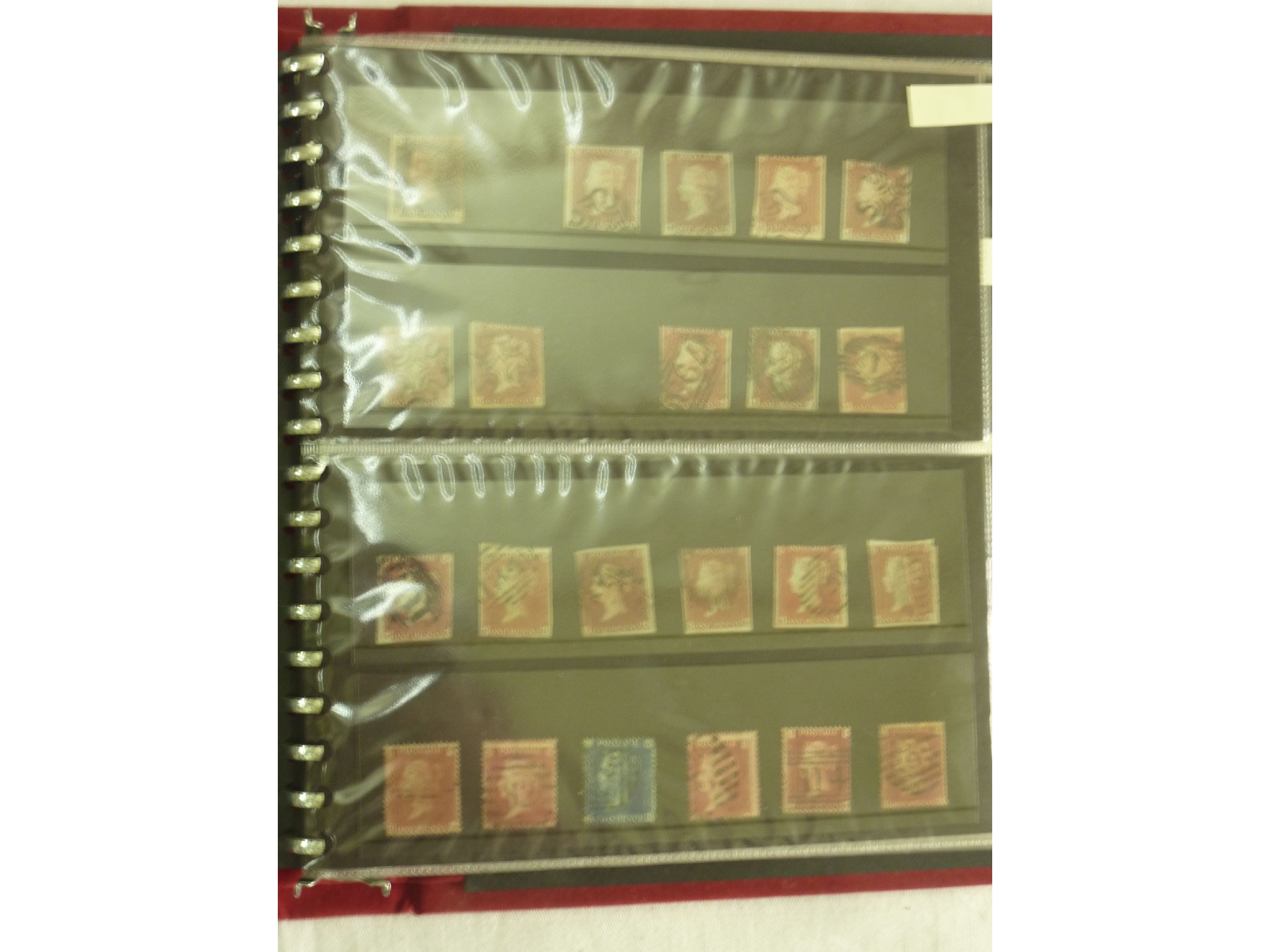 Appraisal: A folder of GB and Indian stamps from Queen Victoria