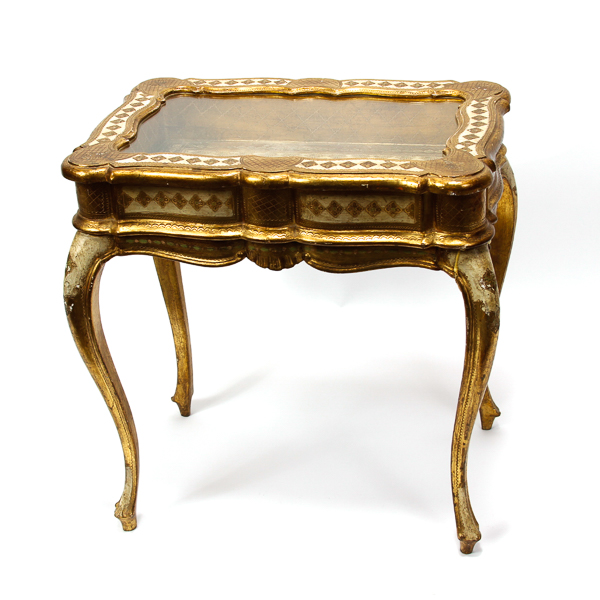 Appraisal: Italian gilt gesso glass top curio table H x L