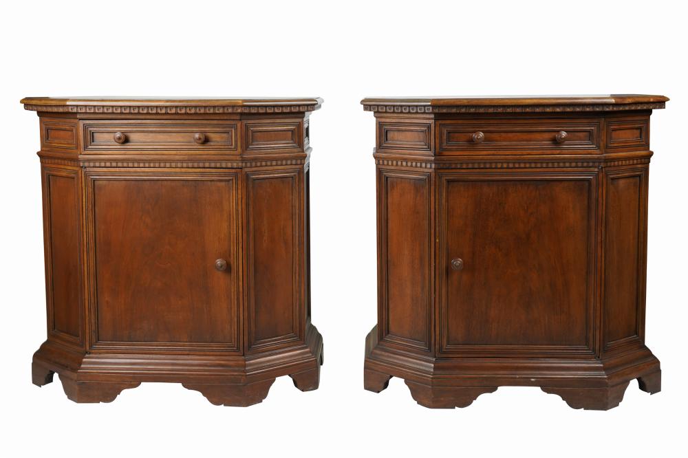 Appraisal: PAIR OF TUSCAN STYLE WALNUT CABINETSeach with canted corners and