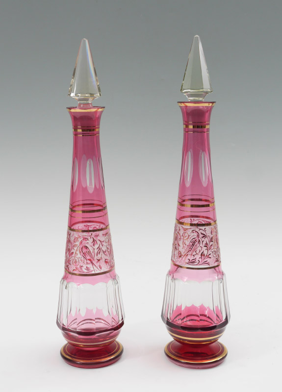 Appraisal: PAIR OF TALL MOSER DECANTERS Cranberry cut to clear with