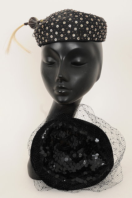 Appraisal: A s black hat with beaded and small gold star