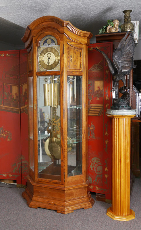 Appraisal: HOWARD MILLER MAJESTIC CURIO GRANDFATHER CLOCK Oak case Arched pediment