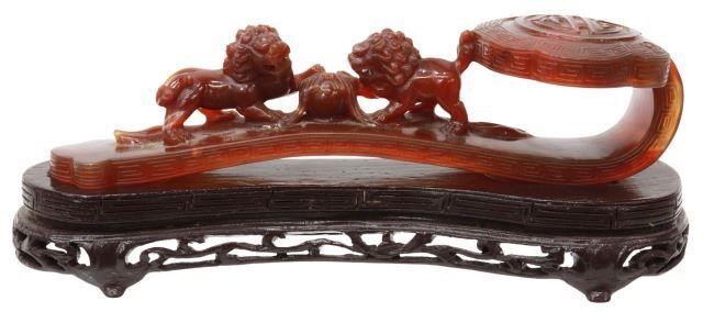 Appraisal: Chinese carved carnelian agate ruyi scepter with Greek key border