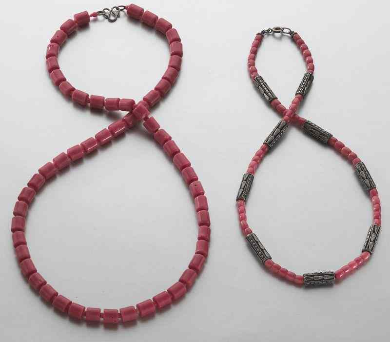 Appraisal: Chinese carved red coral necklaces International buyers should note that