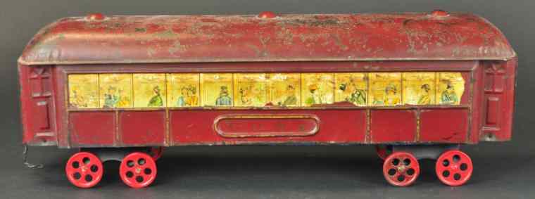 Appraisal: PRESSED STEEL TRAIN COACH Painted in maroon overall features lithographed