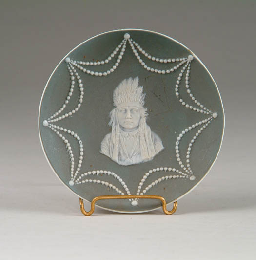 Appraisal: GREEN AND WHITE JASPER PLATE WITH INDIAN Indian Chief center