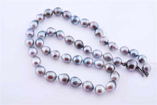 Appraisal: A STRAND OF SILVER CULTURED PEARLS TO AN CT GOLD