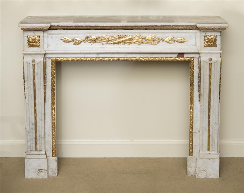 Appraisal: LOUIS XVI STYLE GILT-METAL-MOUNTED WHITE MARBLE FIREPLACE SURROUND Of inverted