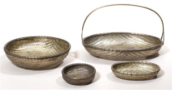 Appraisal: FOUR SILVER PLAITED BASKETS Burma D and cm L and