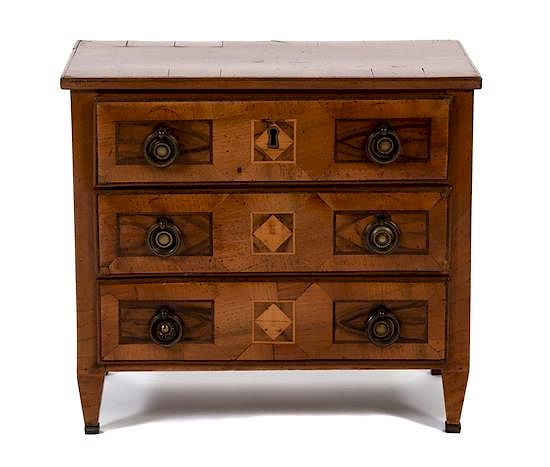 Appraisal: An Italian Neoclassical Style Fruitwood Miniature Chest of Drawers An