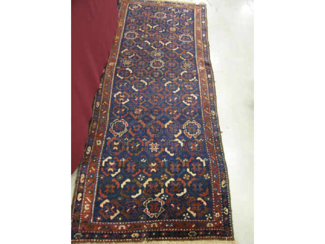 Appraisal: Kord Persian Handmade Runner stylized floral on deep blue field