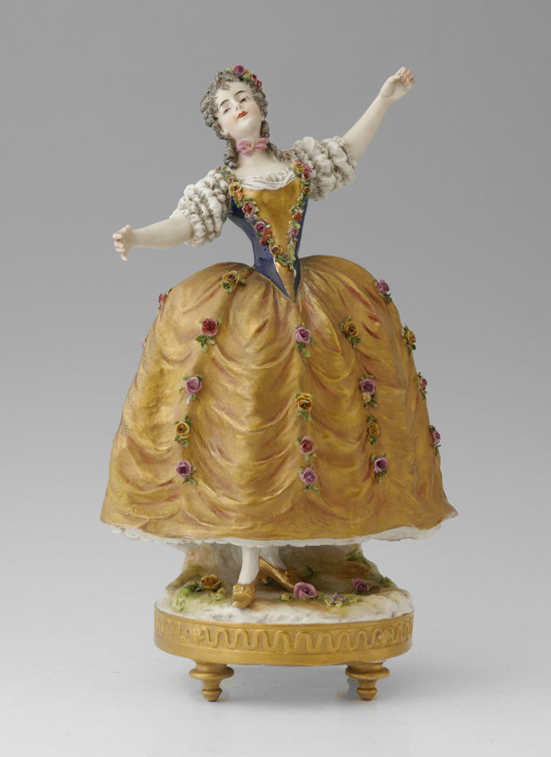 Appraisal: CONTINENTAL PORCELAIN FIGURINE OF LADY DANCING Figure of woman with