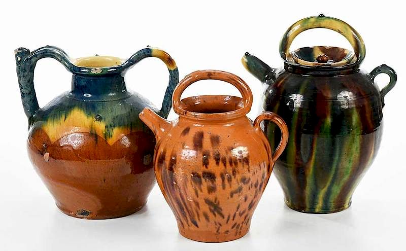 Appraisal: Three French Provincial Gargoulettes th century glazed earthenware with applied