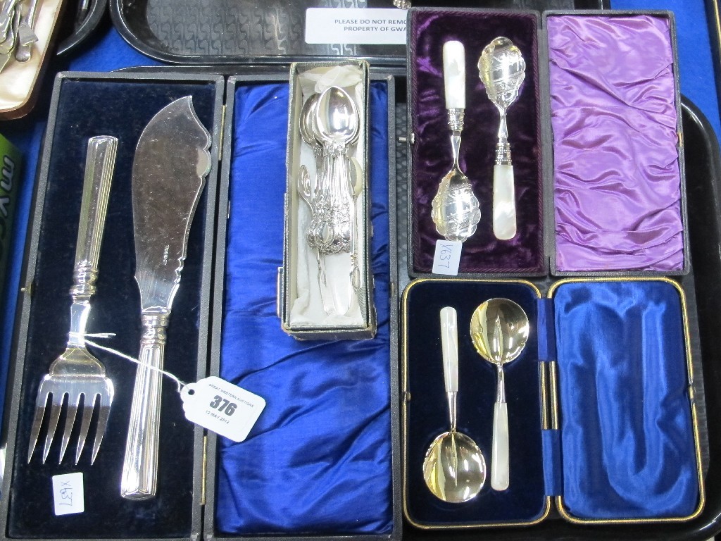 Appraisal: A lot comprising cased fish servers two spoon sets and