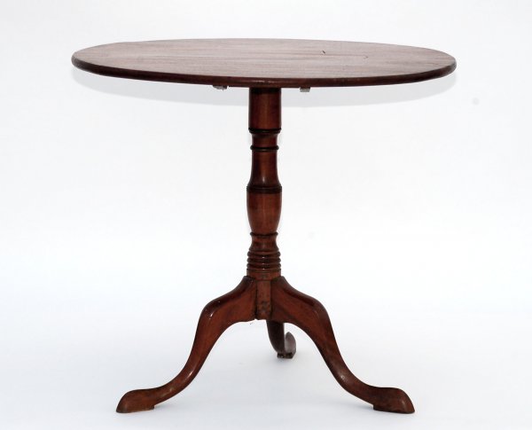 Appraisal: Tilt top tea table Turned vasi form base with trifed