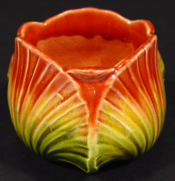 Appraisal: Ault shell shaped pot decorated in a red yellow and