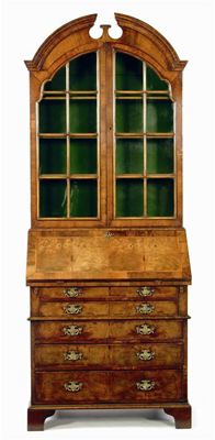 Appraisal: A walnut bureau bookcase in Queen Anne style the astragal