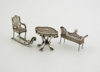 Appraisal: Three filigree examples a bench seat sled and table on