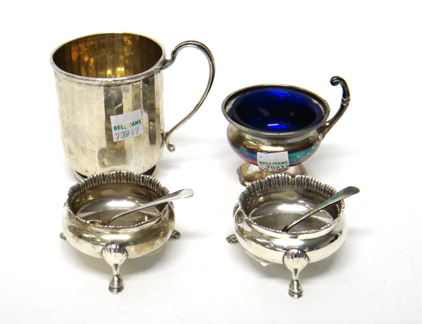 Appraisal: Silver comprising a pair of circular salts each raised on