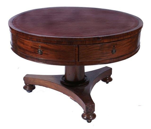 Appraisal: A TH CENTURY MAHOGANY CIRCULAR DRUM TABLE fitted four drawers