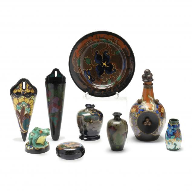 Appraisal: GROUP OF NINE GOUDA POTTERY ITEMS Made in Holland to