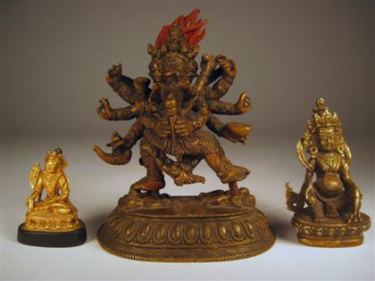 Appraisal: Three Sino-Tibetan gilt metal figures th century and later