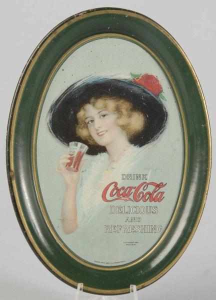 Appraisal: Coca-Cola Change Tray Description Fairly clean border and rim Heavier