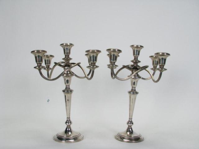 Appraisal: Pair of Sterling Weighted Five-Branch Candelabra '' high