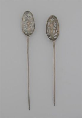 Appraisal: Two George II rattail mote spoons with scroll-pierced bowls one