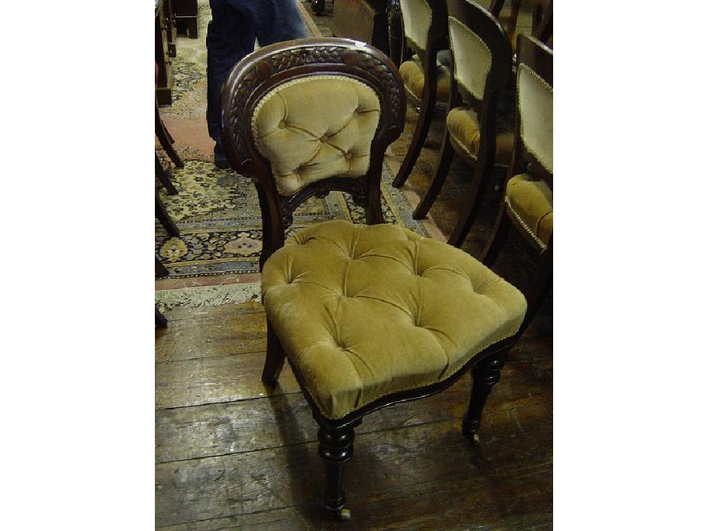 Appraisal: A set of Victorian mahogany dining chairs with button upholstered