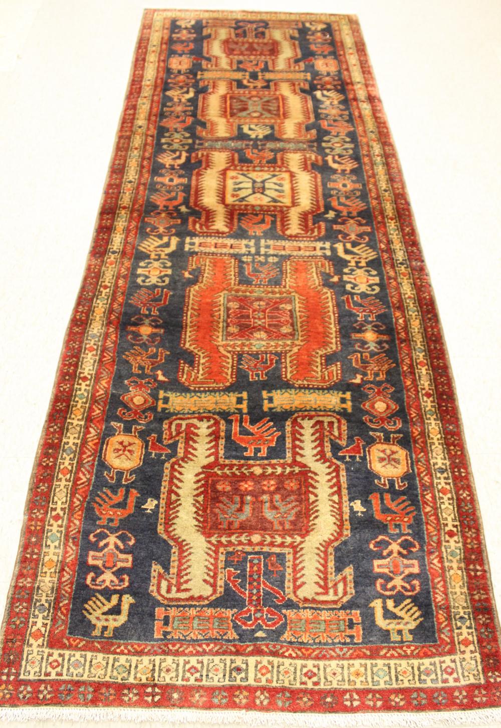 Appraisal: SEMI-ANTIQUE PERSIAN TRIBAL AREA RUG five geometric medallions stylized birds