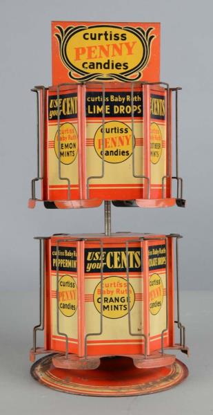 Appraisal: Curtiss Penny Candies Countertop Display Tin lithographed countertop carousel display