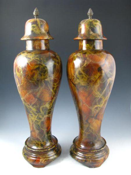 Appraisal: Pair of Decorative Urns with pineapple finial lid in