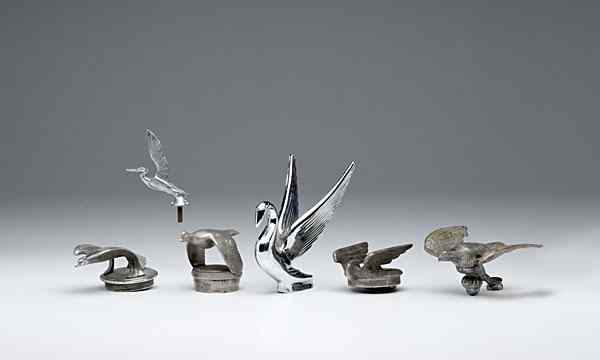 Appraisal: Bird Hood Ornaments American ca - s an assembled group