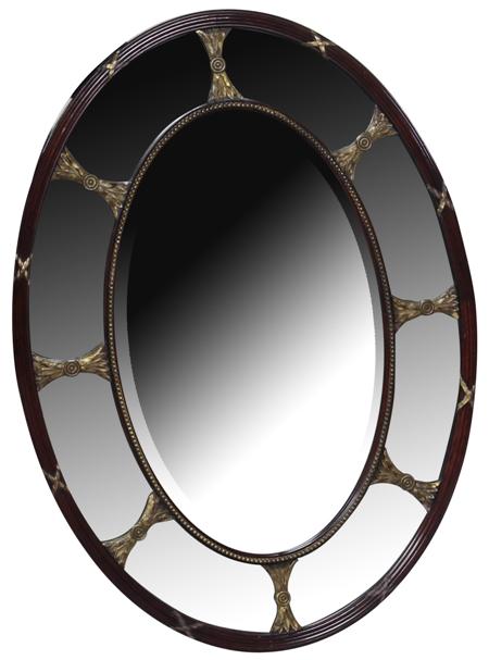 Appraisal: A th century oval mahogany and gilt mirror the reeded