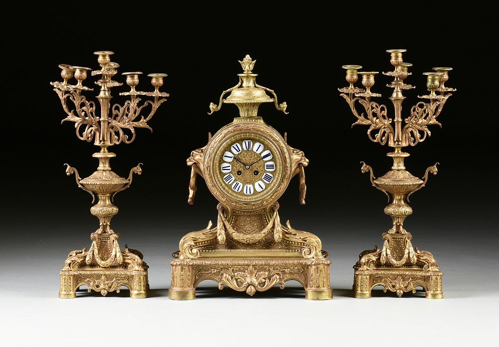 Appraisal: A THREE PIECE LOUIS XVI STYLE GILT BRONZE MANTLE CLOCK