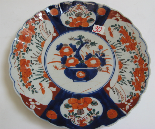 Appraisal: A JAPANESE IMARI TH C PORCELAIN CHARGER the face hand