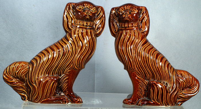 Appraisal: Pr Rockingham style seated spaniels inscribed L R on bottoms