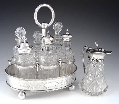 Appraisal: MAPPIN BROS SILVER PLATE CASTOR SET Silver plate stand with