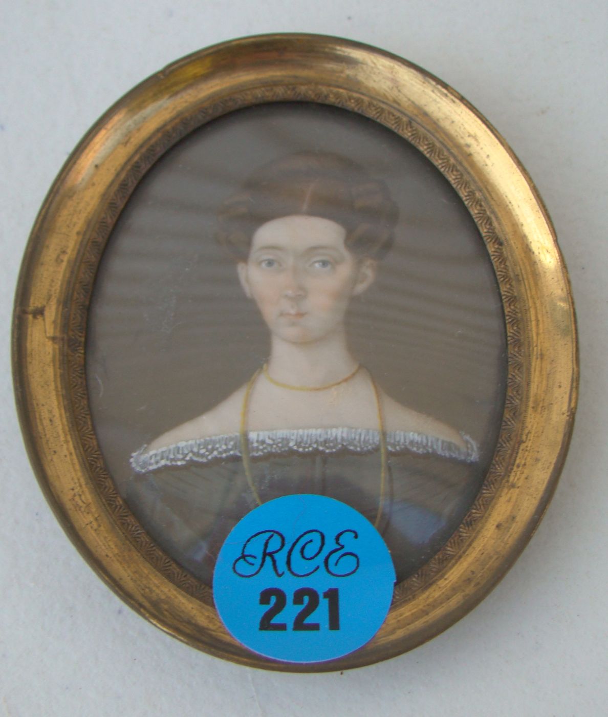 Appraisal: MINIATURE PORTRAIT ON IVORY Circa Bust portrait of a young