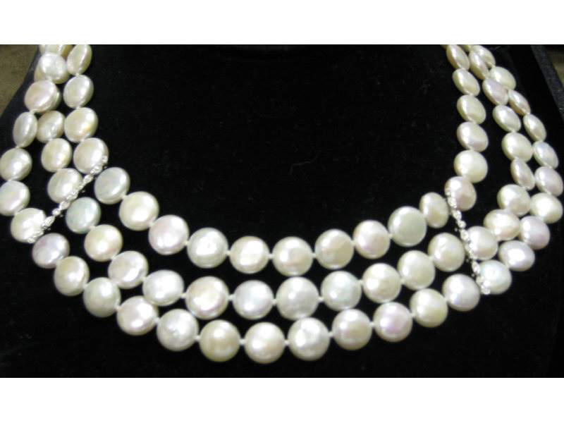 Appraisal: COIN PEARL NECKLACE Three strand button pearls with very good